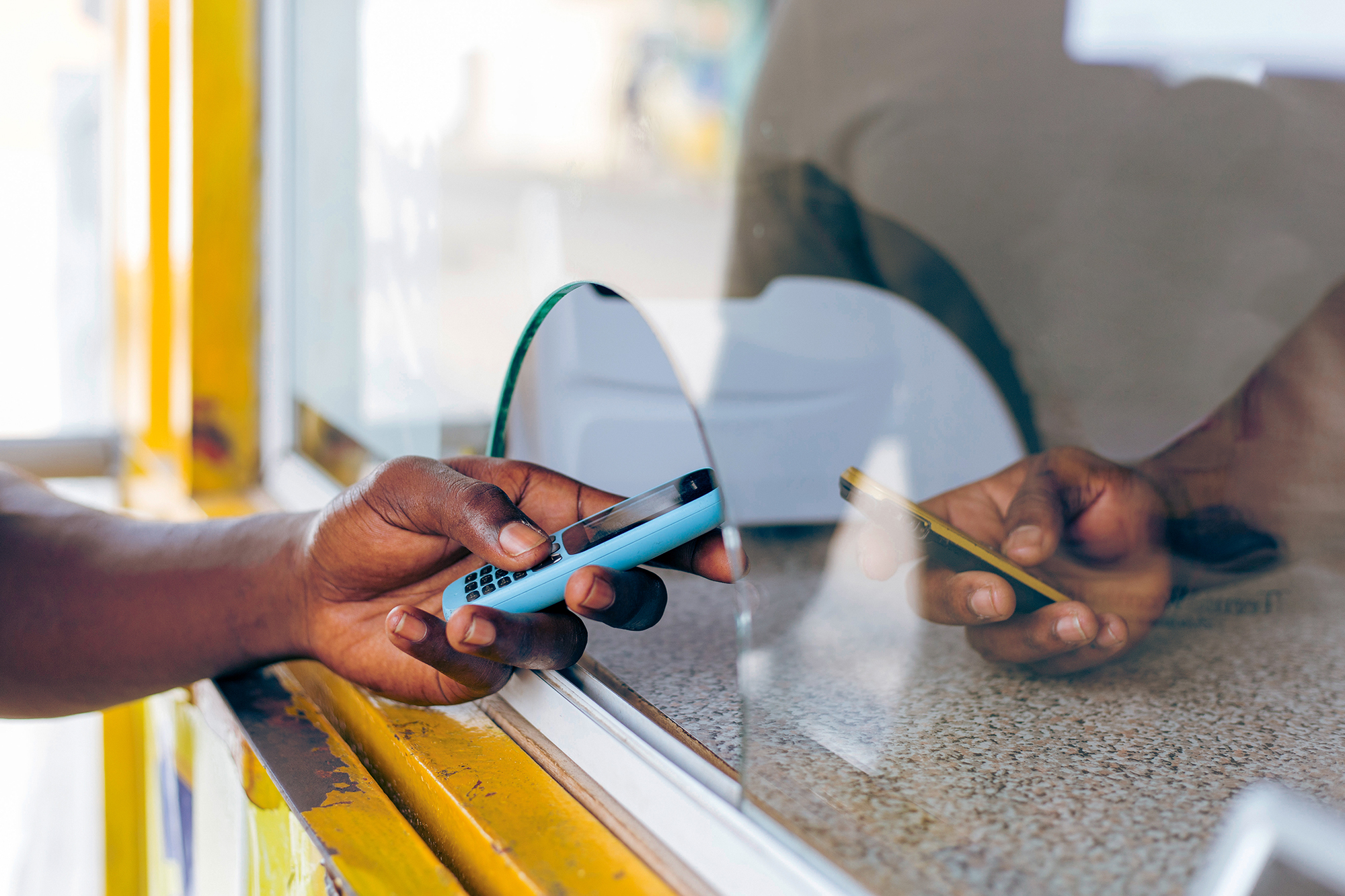 Mobile phones are used to transfer cash